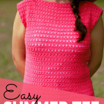 girl outdoors wearing red crochet summer tee and white jeans-free crochet pattern