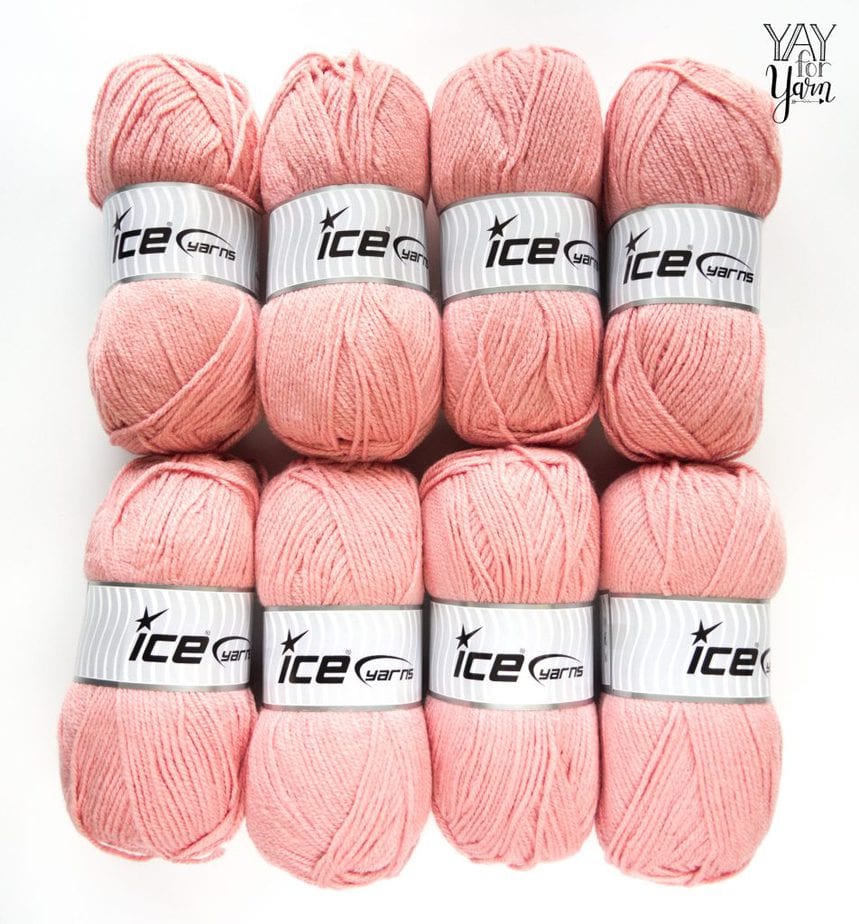 8 skeins of pink worsted weight acrylic yarn